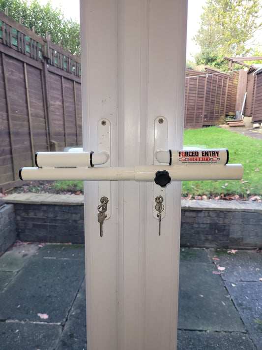 White patio door bar